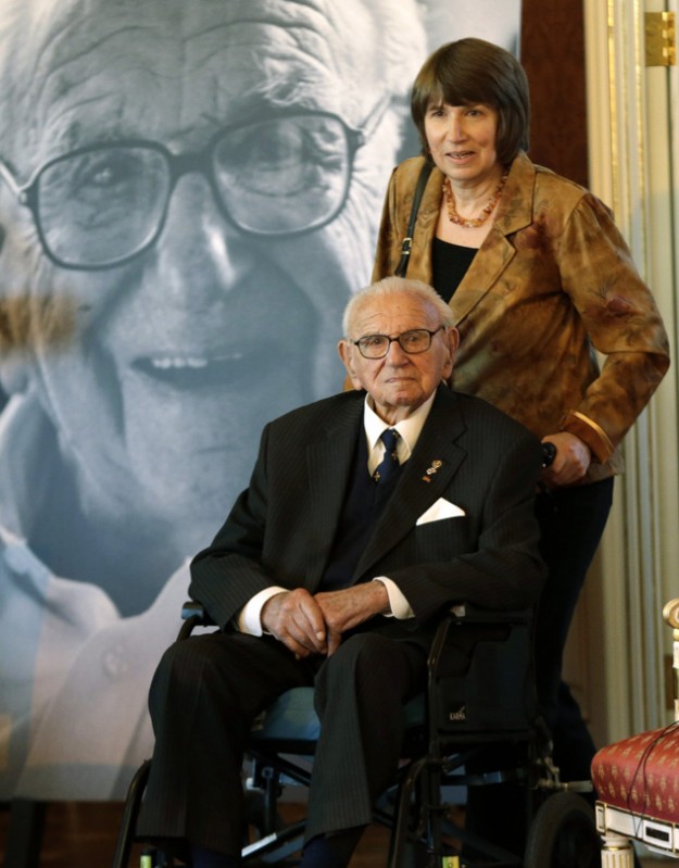105 year-old Sir Nicholas Winton arrives for a ceremony to be decorated with the highest Czech Republic's decoration, The Order of the White Lion at the Prague Castle in Prague, Czech Republic, Tuesday, Oct. 28, 2014. Sir Winton saved 669 Jewish children from Nazi annihilation by transporting them out of Prague to Great Britain in 1939. (AP Photo/Petr David Josek)